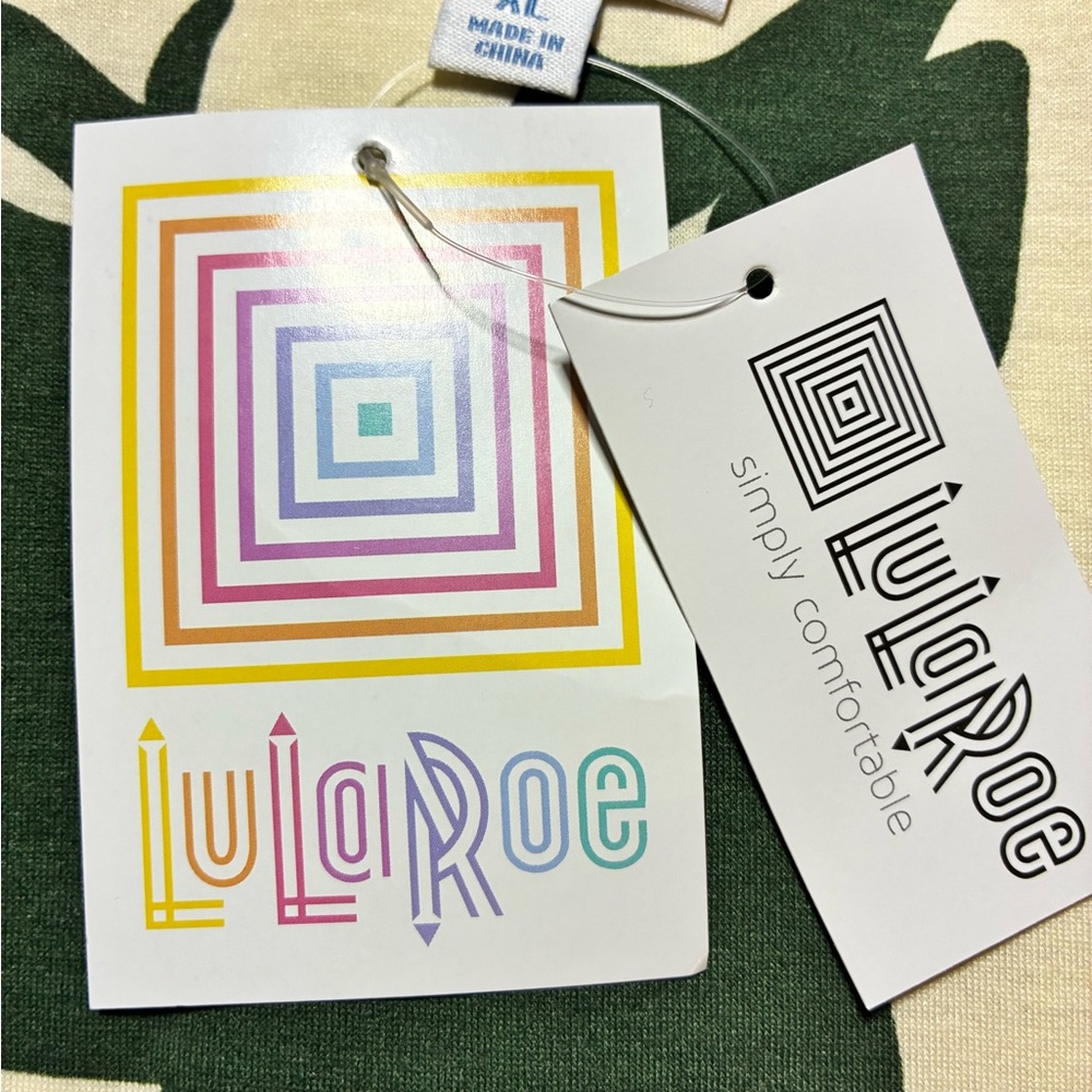 LuLaRoe Cream Baseball Tee with Brown Sleeves and Green Deer Graphic - Picture 2 of 3